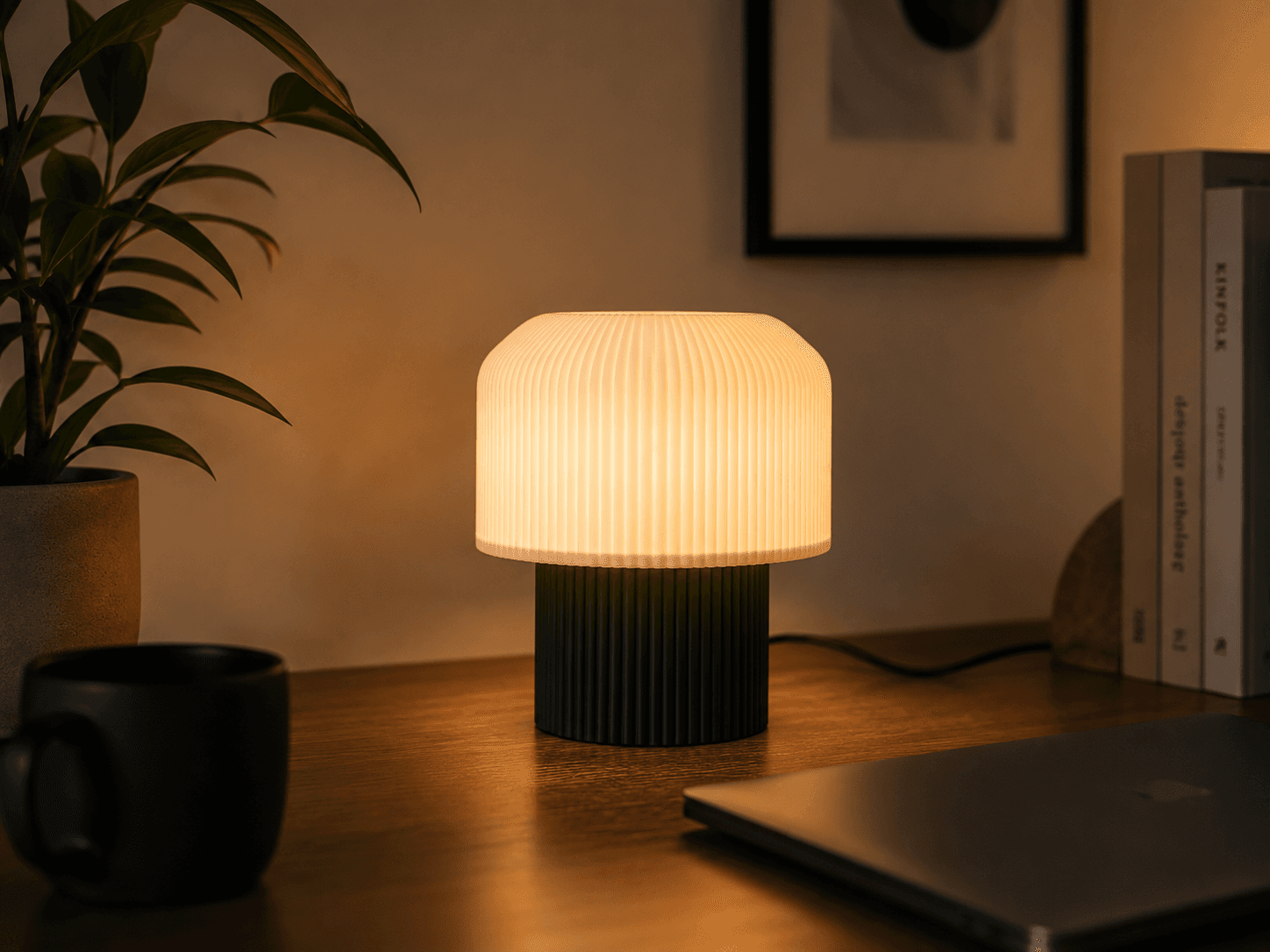 Mushroom — pleated table lamp lit at dusk
